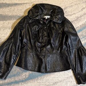 Svetlana black shiny lamé bell sleeve button front jacket with a wide collar